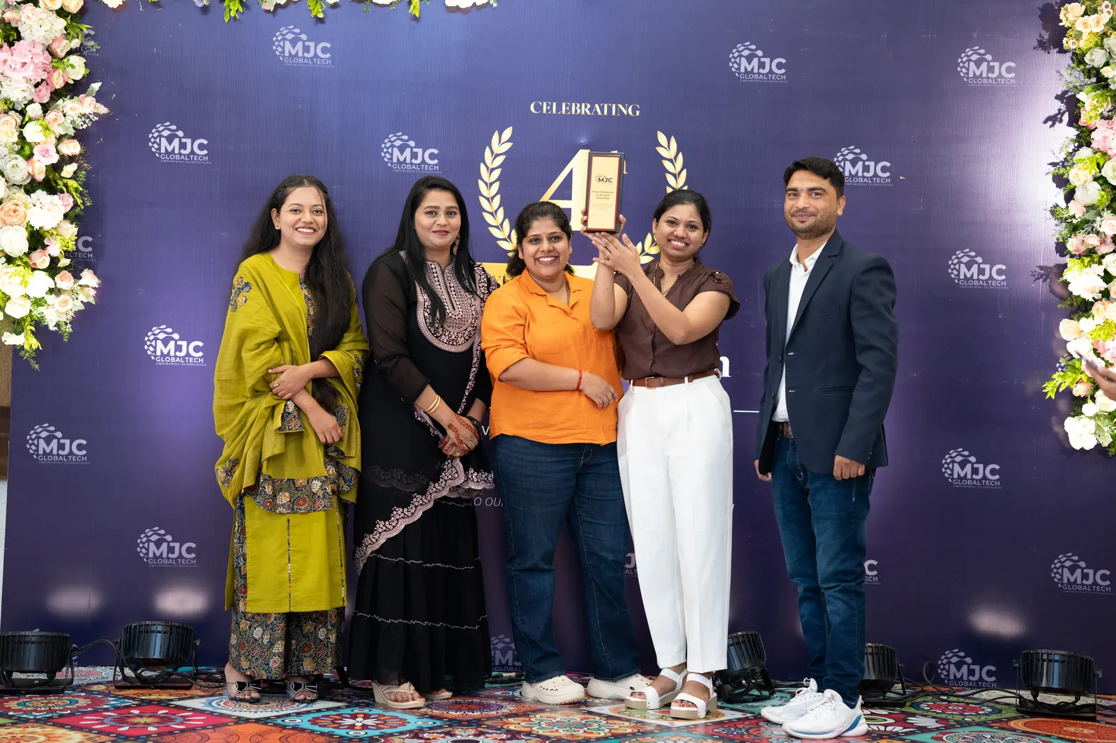Team celebration at MJC GlobalTech 4th anniversary